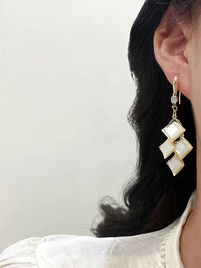 Earrings Yellow Chimes Earrings For Women White Color Crystal Studded Geometrical Shape Drop Earrings For Women and Girls Yellow Chimes