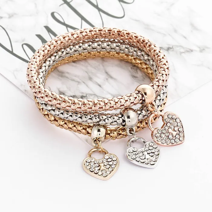 YELLOW CHIMES 3 Pcs Alloy and Australian Crystals Heart Charms Elastic Bangles and Bracelet for Women Girls Free Size Yellow Chimes Bracelets