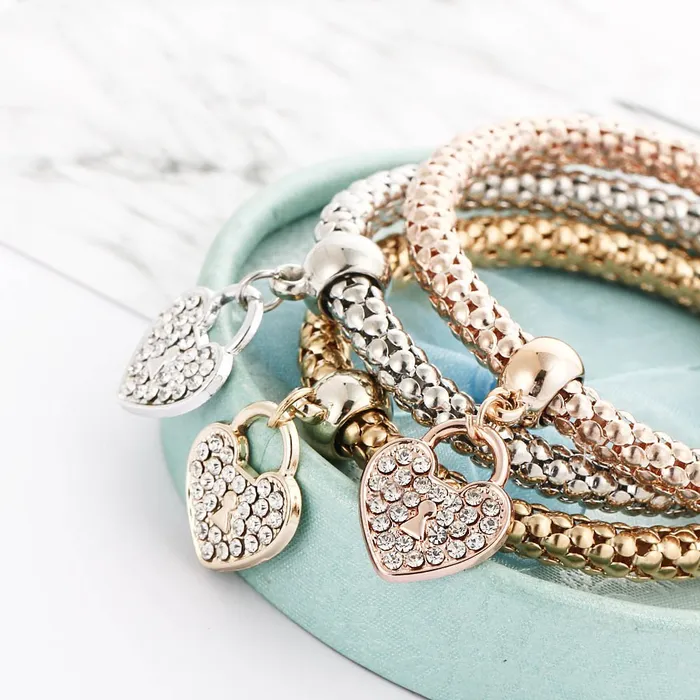YELLOW CHIMES 3 Pcs Alloy and Australian Crystals Heart Charms Elastic Bangles and Bracelet for Women Girls Free Size Yellow Chimes Bracelets