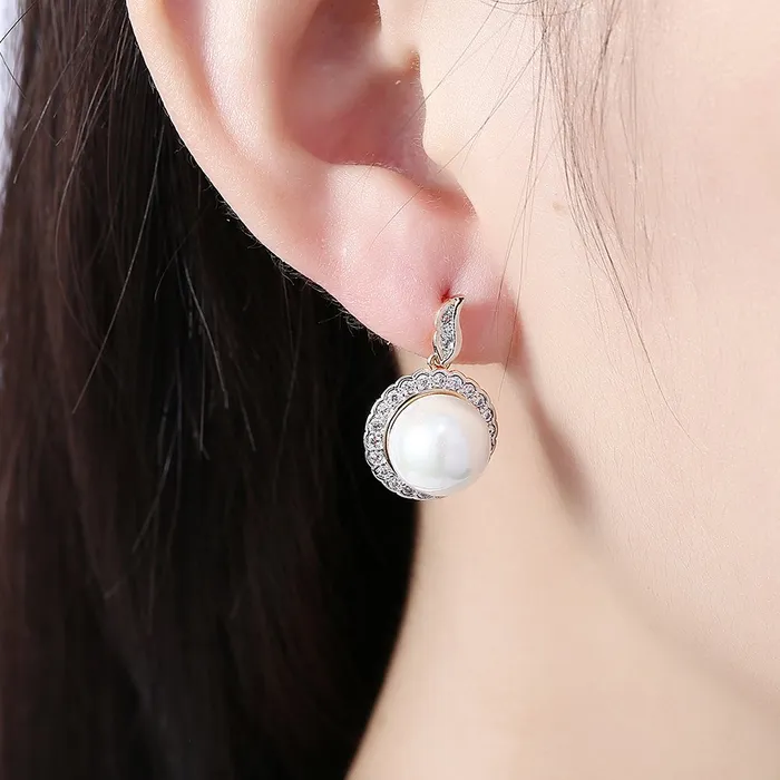 Yellow Chimes A5 Grade Crystal Champagne Gold Plated Pearl Earrings for Women Girls Yellow Chimes Bracelets