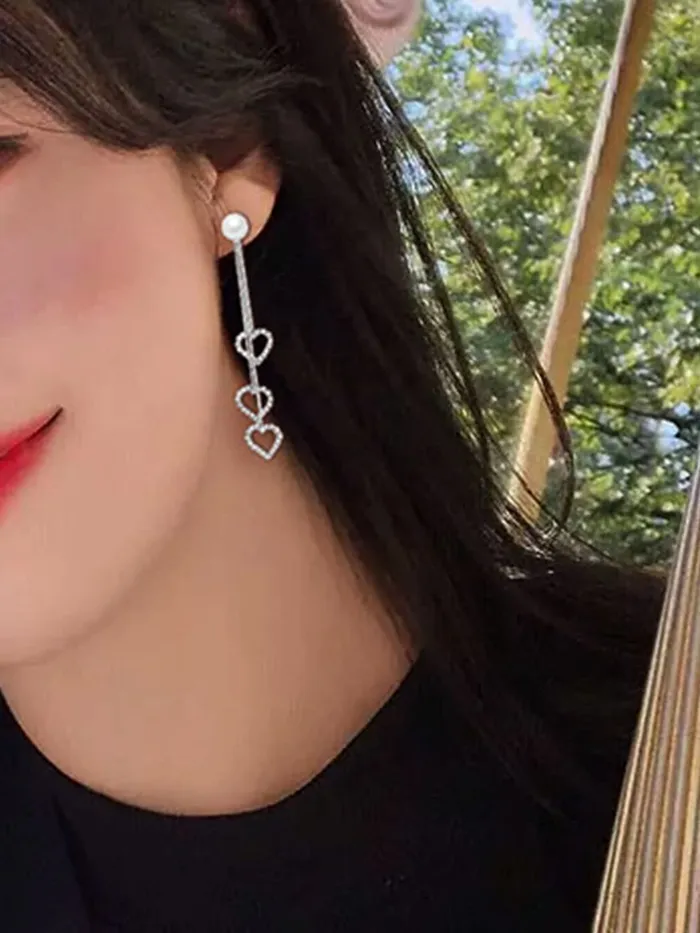 Yellow Chimes Earrings for Women Girls Silver Pearl Dangler Earrings Silver Toned Heart Shaped Long Chain Danglers Earrings for Women Birthday Anniversary Gift Yellow Chimes Necklaces