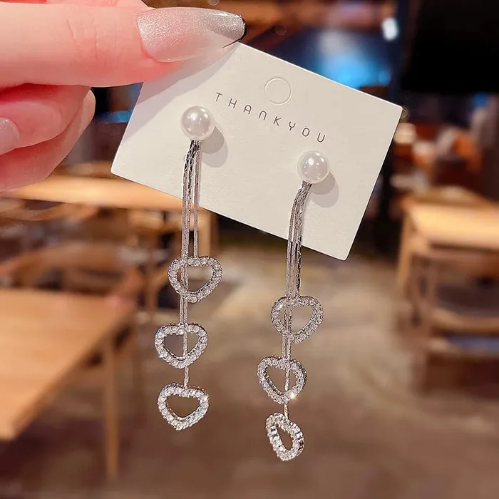 Yellow Chimes Earrings for Women Girls Silver Pearl Dangler Earrings Silver Toned Heart Shaped Long Chain Danglers Earrings for Women Birthday Anniversary Gift Yellow Chimes Necklaces