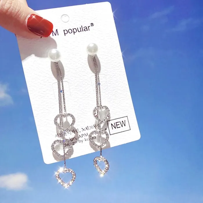 Yellow Chimes Earrings for Women Girls Silver Pearl Dangler Earrings Silver Toned Heart Shaped Long Chain Danglers Earrings for Women Birthday Anniversary Gift Yellow Chimes Necklaces