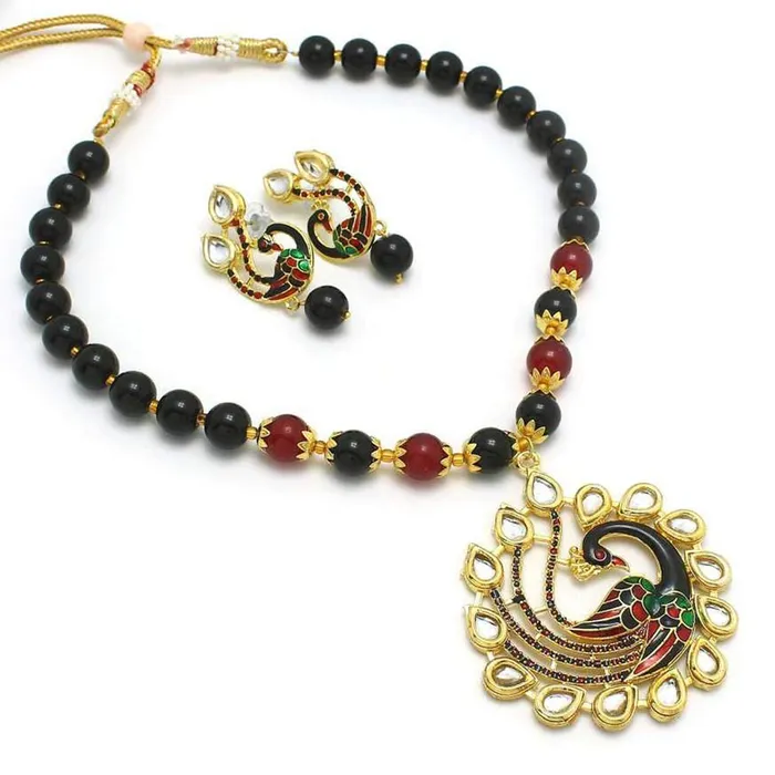Yellow Chimes Exquisite Gold Plated Pearl Beads Kundan Studded Peacock Design Traditional Pendant Necklace Set with Earrings Jewellery Set for Women Yellow Chimes Earrings Yellow Chimes Exquisite Gold Plated Pearl Beads Kundan Studded Peacock Design Traditional Pendant Necklace Set with Earrings Jewellery Set for Women Yellow Chimes Earrings