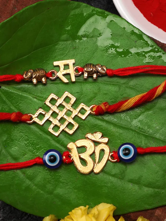 Yellow Chimes Necklaces Yellow Chimes Combo of 3 Pcs Handmade Dori Worked Silver Toned OM Initial Letter V and Celtic Design Evil Eye Beads Rakhi for Brother with Roli Chawal Red Silver Medium YCTJRK24BHAYSL