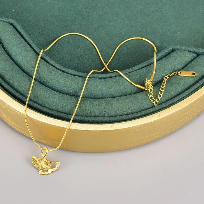 Yellow Chimes Pendant for Women and Girls Fashion Golden Pendant Necklace for Women Stainless Steel Gold Plated Ginkgo Biloba Leaf Shaped Pendant Chain Birthday Gift for Girls and Women Yellow Chimes Rings