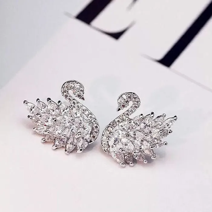 Yellow Chimes Platinum Plated Swan Design Crystal Stud Earrings for Women and Girls Yellow Chimes Necklaces