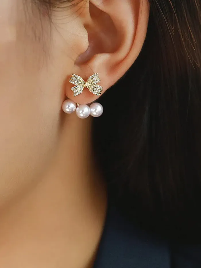 Yellow Chimes Rings Yellow Chimes Earrings For Women Gold Tone Crystal Studded Bow Shaped Stud Pearl Drop Earrings For Women and Girls