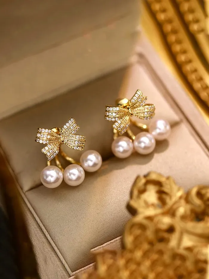 Yellow Chimes Rings Yellow Chimes Earrings For Women Gold Tone Crystal Studded Bow Shaped Stud Pearl Drop Earrings For Women and Girls