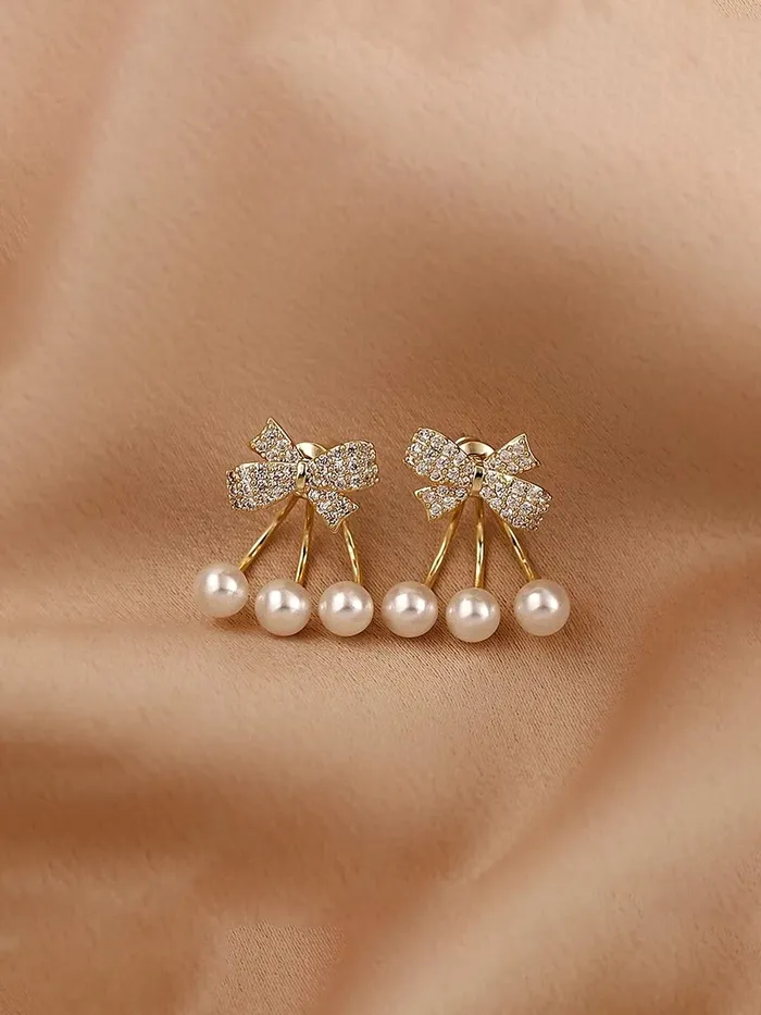 Yellow Chimes Rings Yellow Chimes Earrings For Women Gold Tone Crystal Studded Bow Shaped Stud Pearl Drop Earrings For Women and Girls