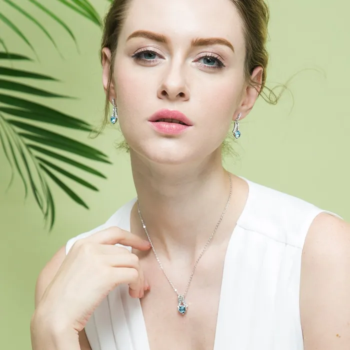 YELLOW CHIMES Swarovski Elements Blue Crystal Designer Pendant for Women and Girls Yellow Chimes Bracelets