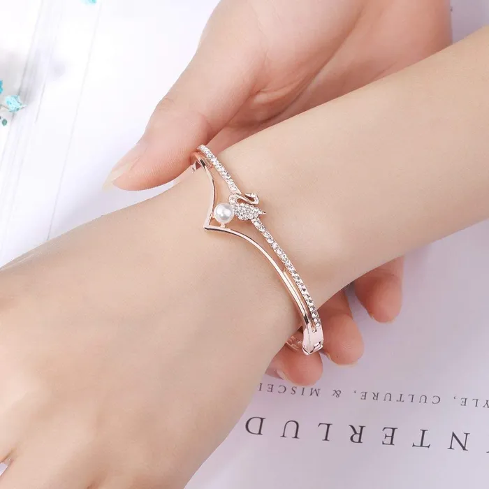Yellow Chimes Yellow Chimes Swan On Pearl Elegant Rose Gold Charm Bracelet for Women and Girls Bracelets